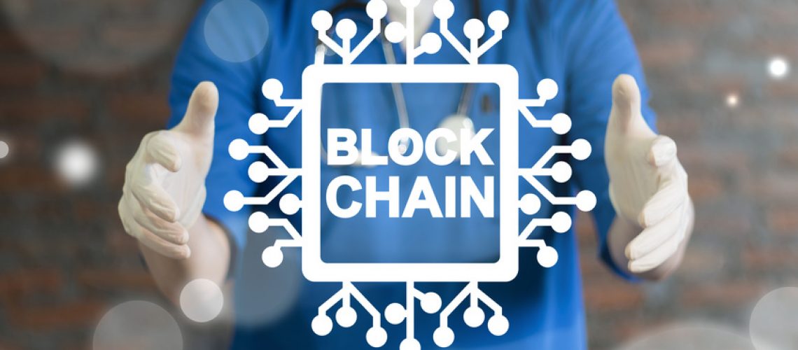 Blockchain Medicine Information Technology. Doctor using virtual interface offers semiconductor (circuit board) blockchain text icon. Block Chain Health Care concept.